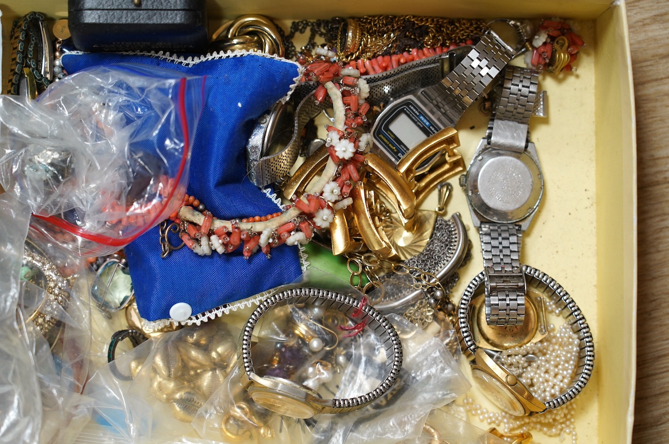 A quantity of assorted costume jewellery and wrist watches. Condition - poor to fair